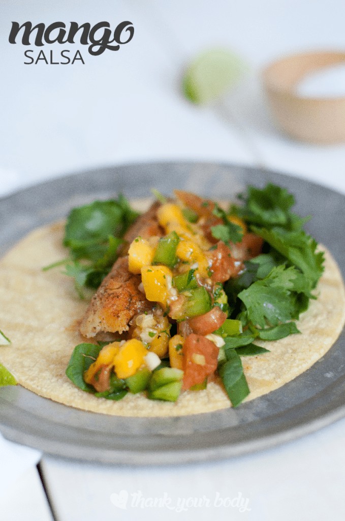 Here is a delicious and easy mango salsa recipe with some tips on choosing the best mango, too! Enjoy mango salsa topped on homemade tortilla chips. Yum!