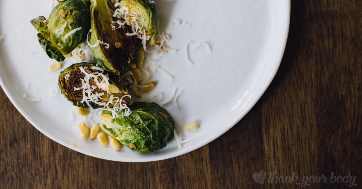 Pan-roasted savory Brussels sprouts with pine nuts, a hint of balsamic vinegar and a little organic cream will make you re-think Brussels sprouts entirely!
