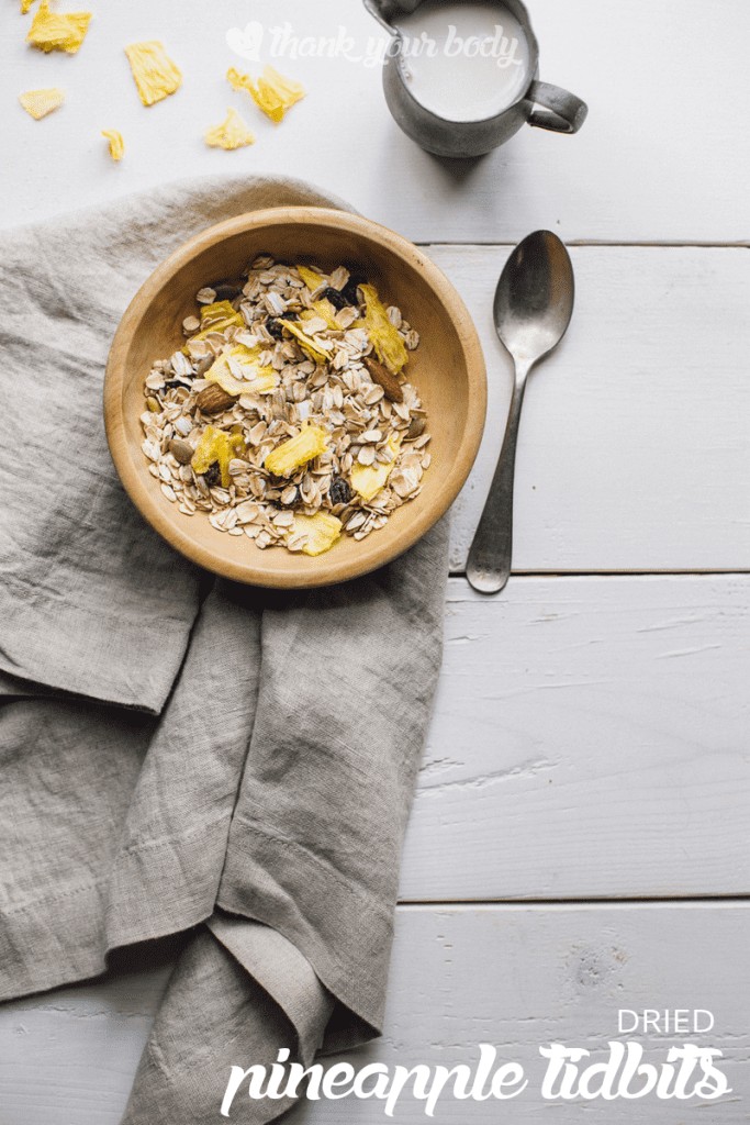 Dried pineapple tidbits are a healthy, sweet and satisfying snack. It's easy to prepare these from fresh organic pineapple, in the oven or dehydrator.