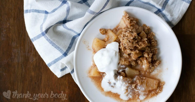 Cinnamon Maple Apple Crisp! Warm cinnamon and a hint of maple with tart apples under a chewy oatmeal crust to give this healthy dessert its character.